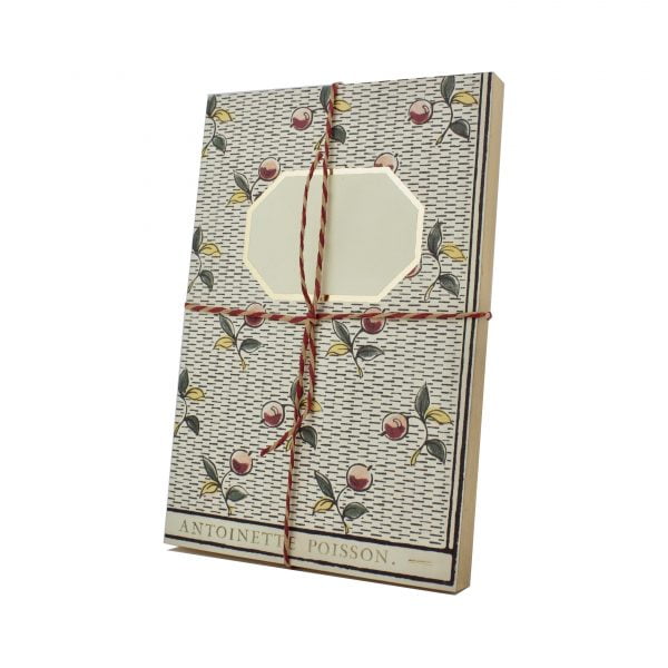 A hand-crafted notebook with a wallpaper design on the cover.