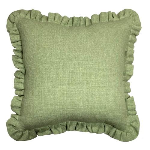A green linen cushion with a frilled edge on top of a white background.