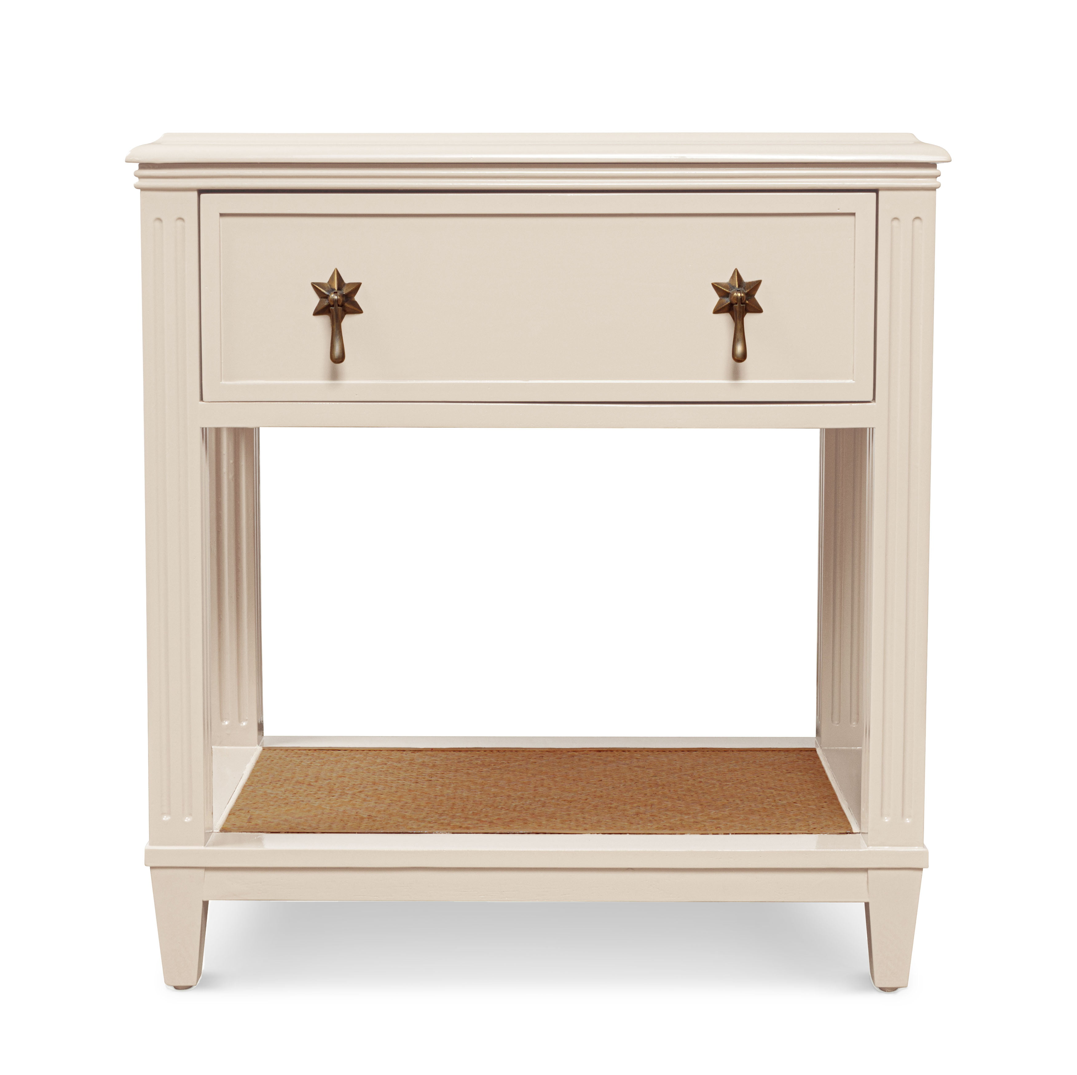 A white wooden bedside table with star-shaped handles.