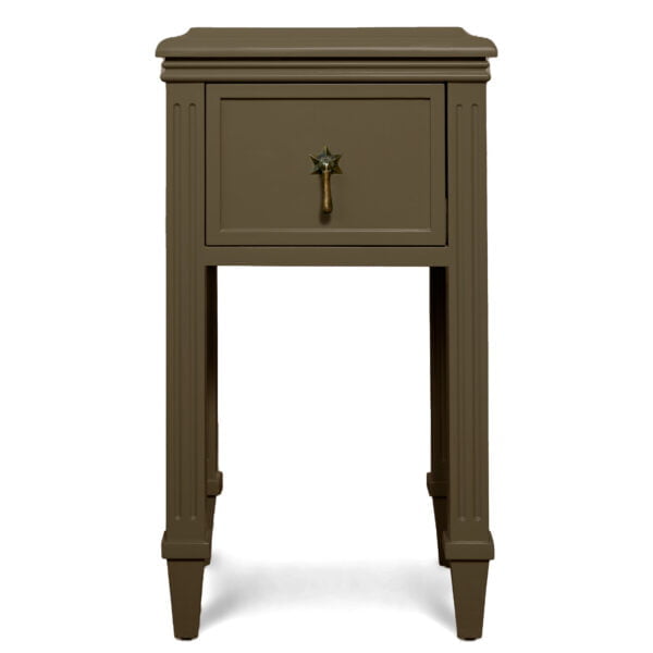 A petite army green-coloured wooden chest of drawer with a star-shaped pull handle.